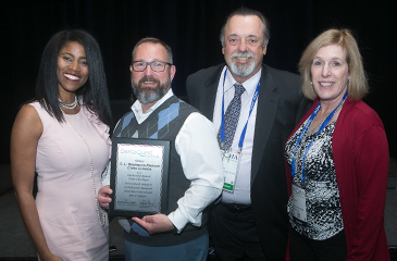 Clinic staff receiving award